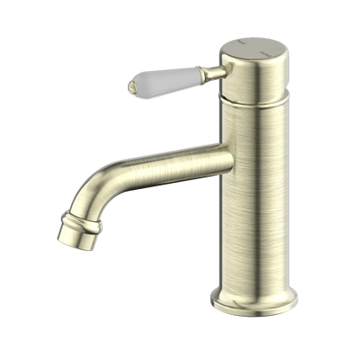 Nero York Straight Basin Mixer With White Porcelain Lever, Aged Brass